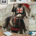 Medieval Knights Templar blanket draped over a sofa with an armored knight, horse, shield and red cross design