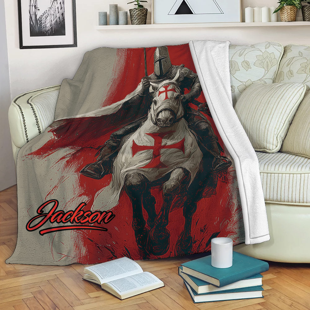 Knights Templar throw blanket displayed on a sofa with armored knight artwork in a bold red and gray palette