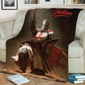 Medieval Knights Templar throw blanket draped over a sofa with armored knight artwork
