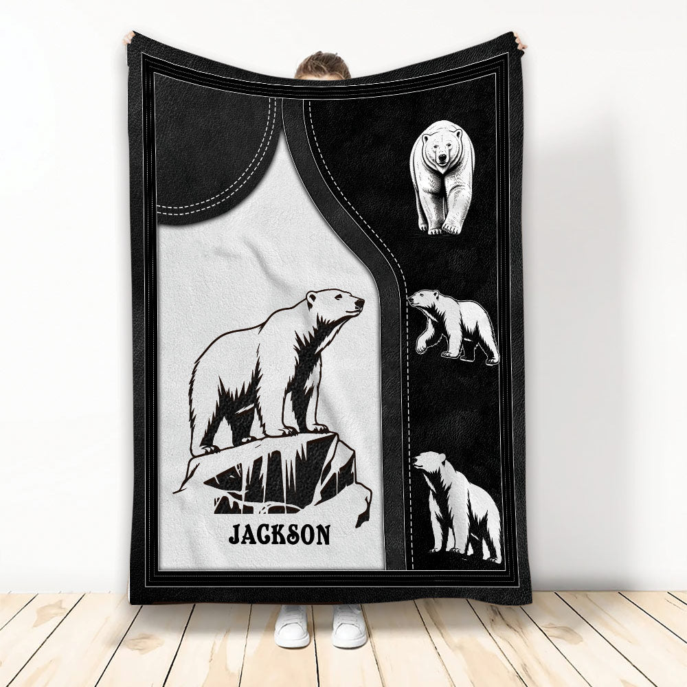 Black and white polar bear throw blanket displayed upright with Arctic wildlife artwork