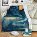Polar bear blanket draped over a sofa with Arctic scenery, moonlit waves, mountains, books, and a coffee mug