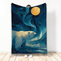 Polar bear throw blanket displayed with Arctic landscape, golden moon, deep blue sky, and mountain artwork
