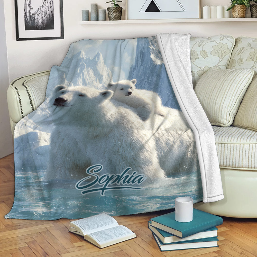 Polar bear and cub throw blanket displayed on a sofa in a cozy living room