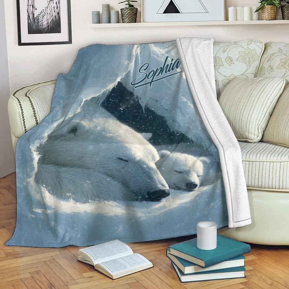 Polar bear throw blanket draped over a sofa with sleeping bears, icy scenery, and cozy reading setting