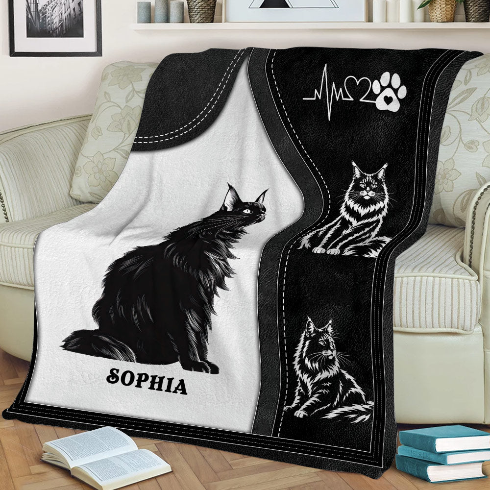 Close view of a custom Maine Coon blanket draped over a sofa