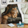 Maine Coon cat blanket draped over a sofa in a cozy reading room with books
