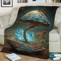 Close view of a fantasy mushroom blanket with crystals, orange flowers, and dark woodland artwork