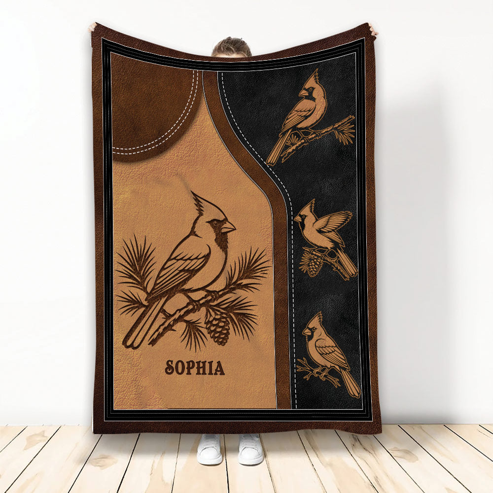 Cardinal throw blanket displayed vertically with vintage bird illustrations in brown, tan, and black
