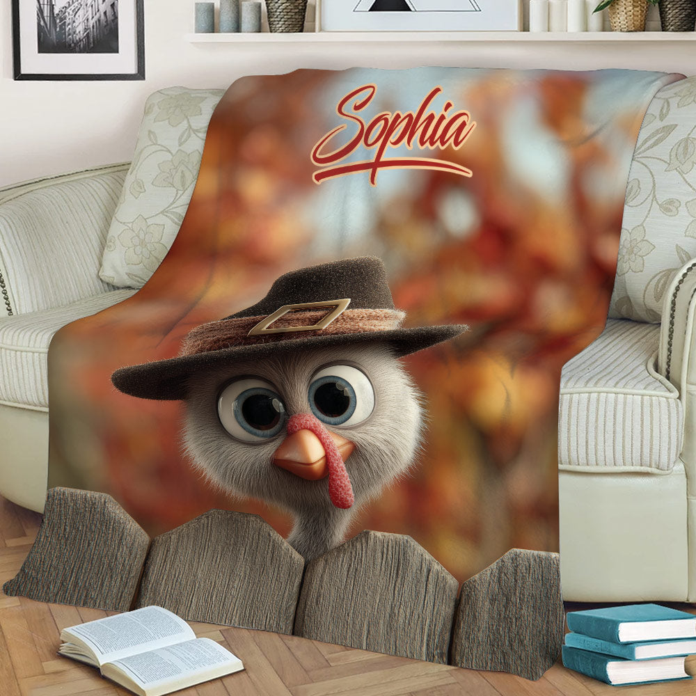 Close view of a Thanksgiving turkey throw blanket with autumn foliage and rustic harvest artwork