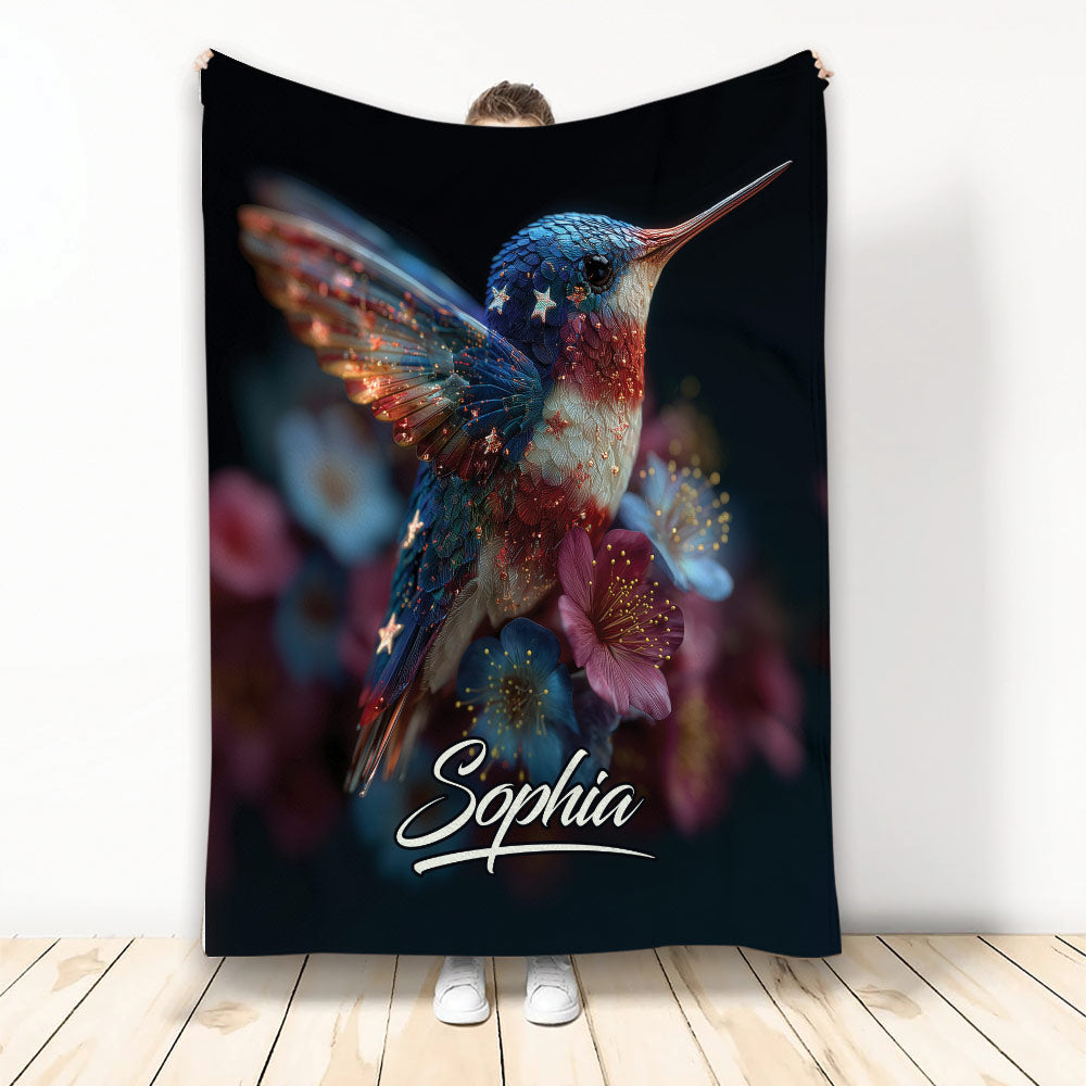 Jewel-toned hummingbird blanket with colorful flowers on a dramatic black background