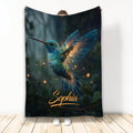 Hummingbird throw blanket with glowing blue wings and enchanted forest artwork