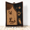 Siamese cat throw blanket displayed with illustrated cats, warm brown tones, black accents, and paw print artwork