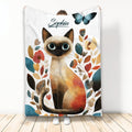 Siamese cat throw blanket displayed with colorful botanical flowers and butterfly artwork