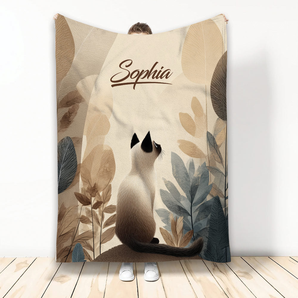 Siamese cat blanket with botanical foliage artwork in warm neutral tones