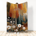 Autumn forest throw blanket with warm fall trees, white daisies, and woodland artwork