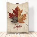 Autumn leaves blanket with layered red, orange, and brown foliage on a rustic cream background