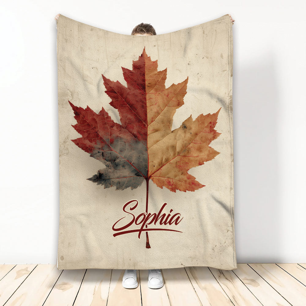 Autumn leaves blanket with layered red, orange, and brown foliage on a rustic cream background