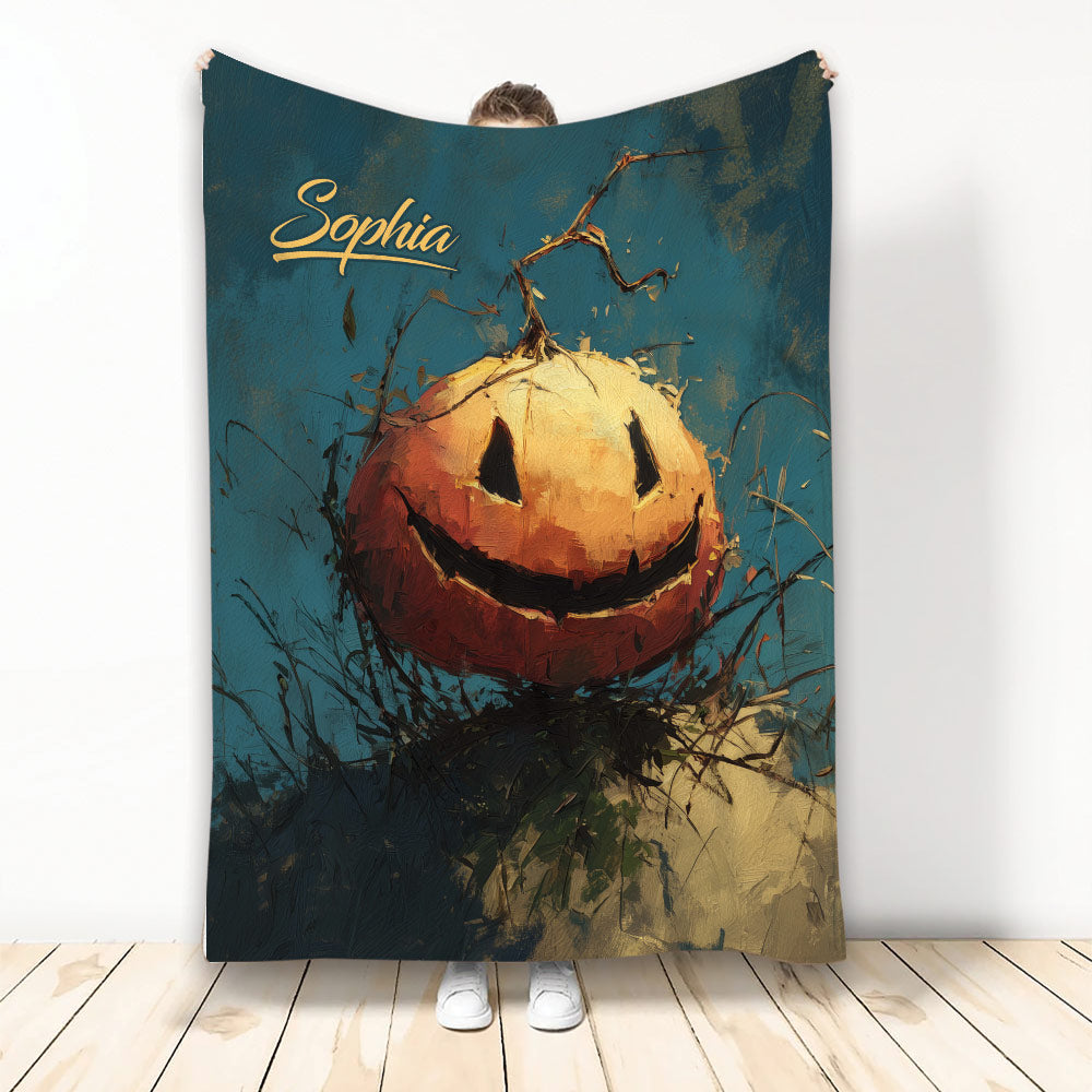 Halloween throw blanket featuring a glowing jack-o'-lantern pumpkin in a moody painted style