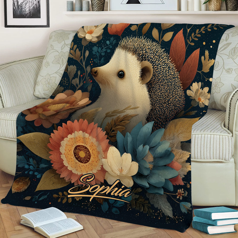 Floral hedgehog blanket draped over a sofa in a cozy living room