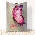 Pink butterfly artwork on a custom blanket shown draped for display