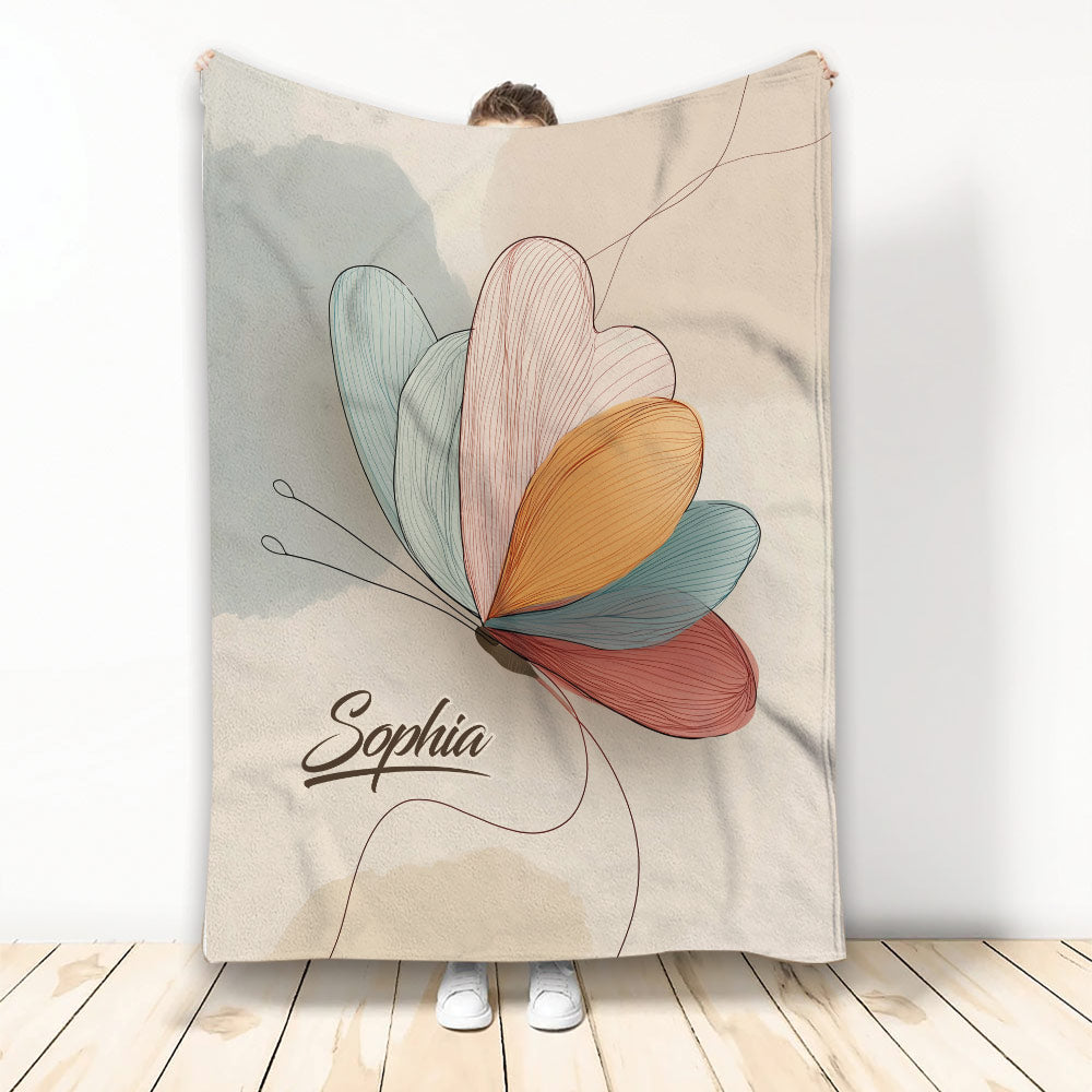 Colorful butterfly line art on a custom throw blanket displayed against a light background