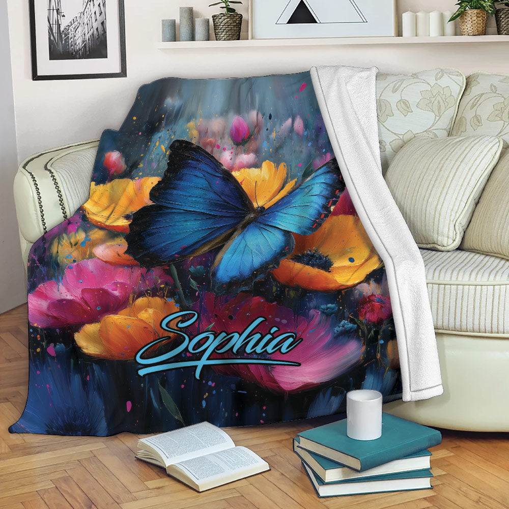 Colorful butterfly throw blanket draped over a sofa with vibrant floral artwork