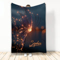 Glowing butterfly throw blanket displayed upright with luminous orange accents on a dark blue design