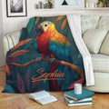 Colorful parrot blanket draped over a sofa with tropical bird and leaf artwork