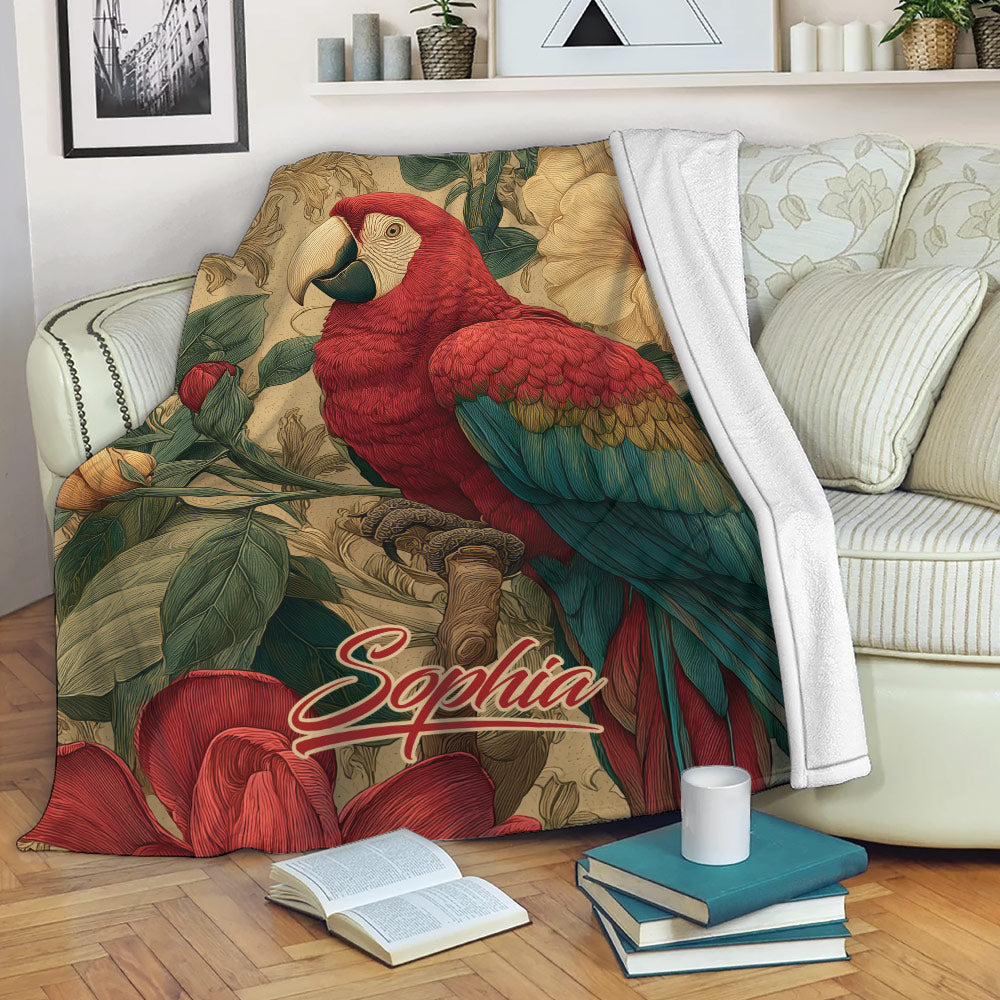 Parrot blanket draped over a sofa with colorful macaw and tropical floral artwork