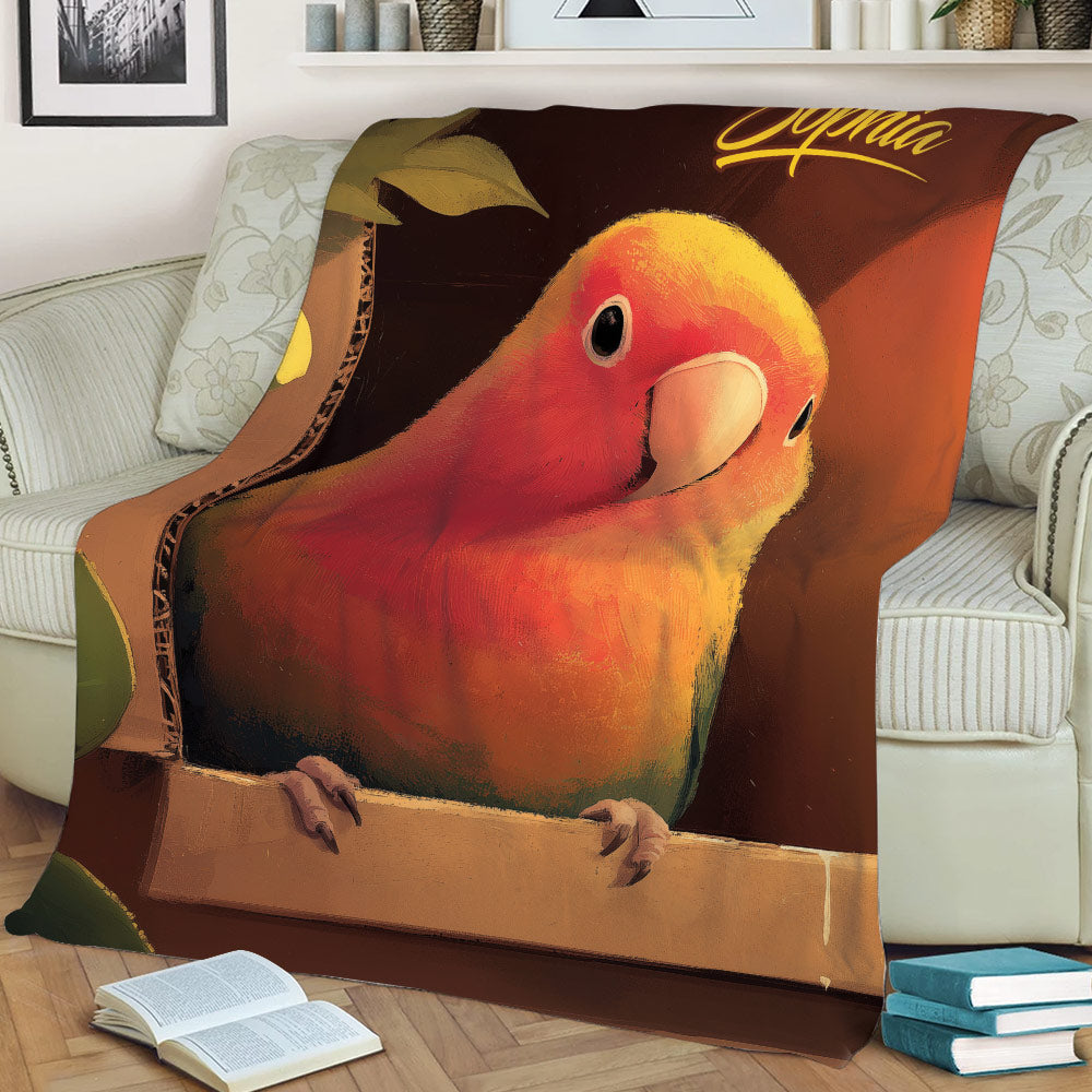 Close view of a vibrant parrot throw blanket styled on a sofa with books