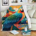 Colorful parrot blanket draped over a sofa, featuring tropical artwork and bold geometric shapes