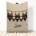 Bat throw blanket featuring five hanging black and tan bats in detailed artwork