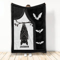 Black and white bat throw blanket displayed upright with a large hanging bat and smaller flying bats