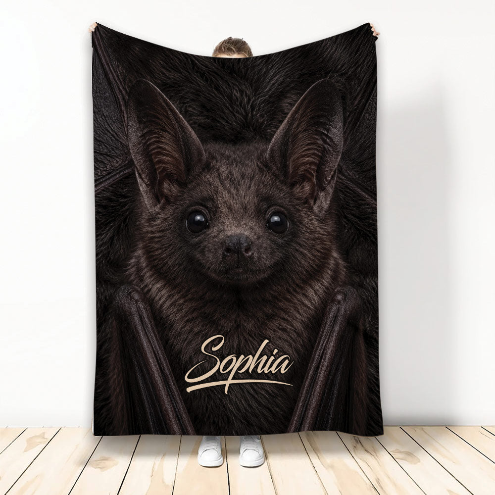 Realistic dark bat artwork on a custom blanket displayed upright against a light background