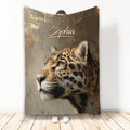 Leopard throw blanket with realistic big cat artwork displayed against a textured neutral background
