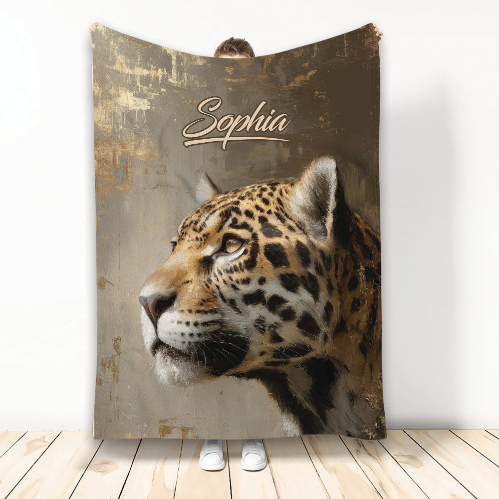 Leopard throw blanket with realistic big cat artwork displayed against a textured neutral background