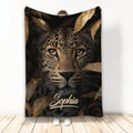 Leopard throw blanket with dramatic big cat artwork, dark foliage, and warm gold accents