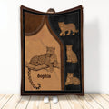 Leopard throw blanket featuring spotted big cats, warm brown tones, black borders, and leather-inspired artwork