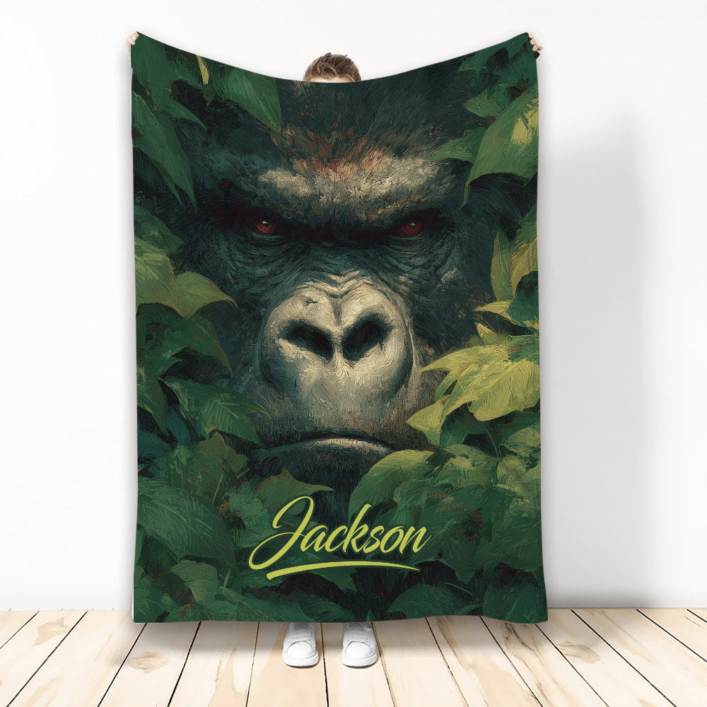 Gorilla throw blanket featuring a dramatic jungle portrait with deep green foliage