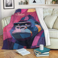Colorful gorilla throw blanket draped over a sofa in a cozy living room