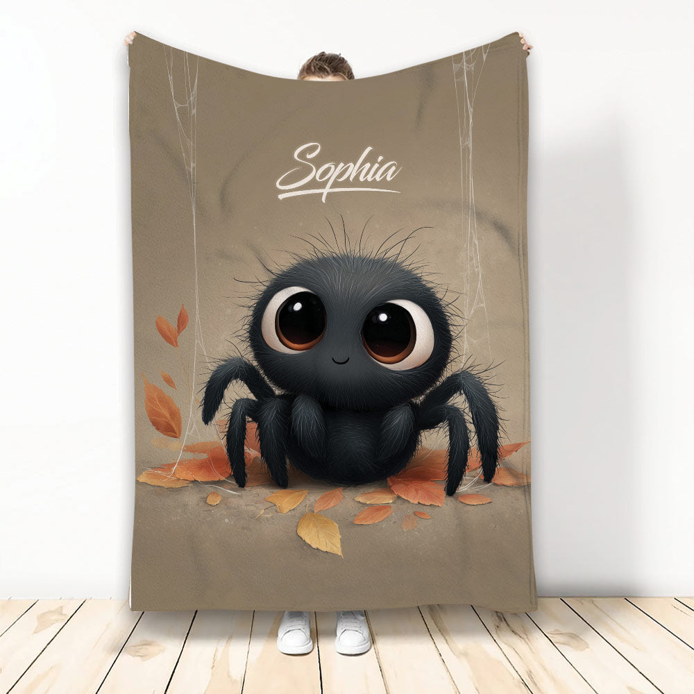 Cute black spider throw blanket with large expressive eyes, autumn leaves, and warm neutral artwork