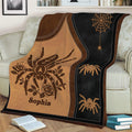 Close view of spider throw blanket design with illustrated spider, roses, web motif, and dark contrast border
