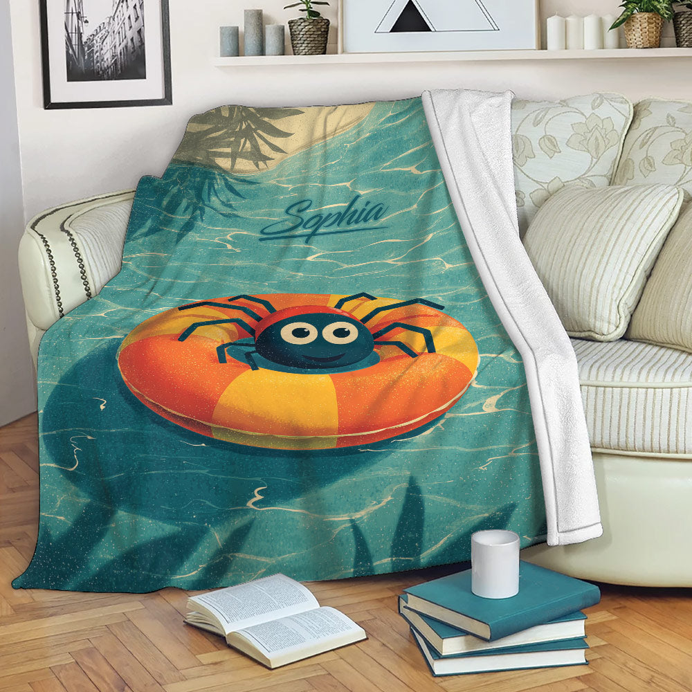 Cute spider throw blanket displayed over a sofa with colorful water-inspired artwork