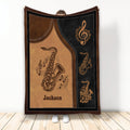 Saxophone blanket displayed upright with vintage brown and black musical artwork