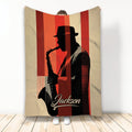 Saxophone throw blanket with a silhouetted musician, retro red stripes, and bold vintage artwork