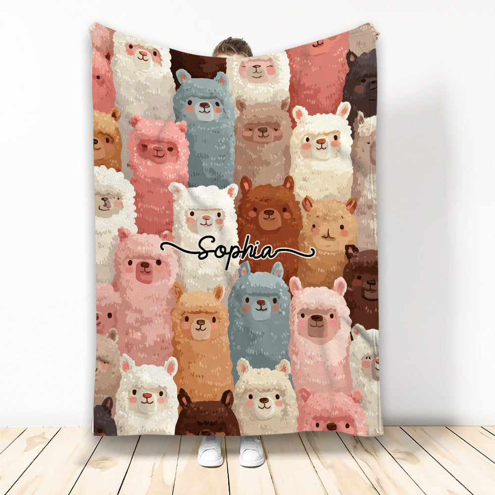 Colorful llama throw blanket displayed upright with a repeating pattern of cute illustrated llamas