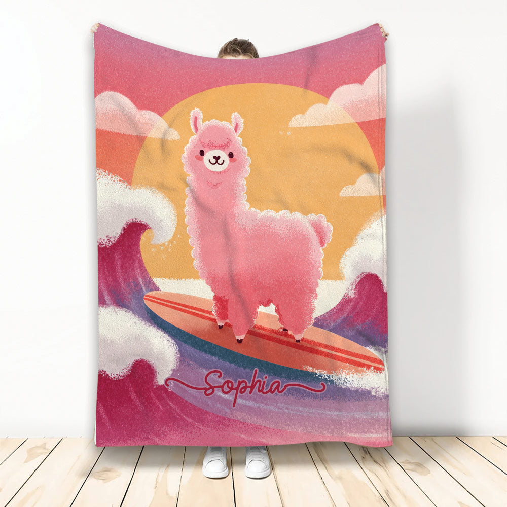 Pink llama surfing on a colorful board against a sunset wave and cloud blanket design