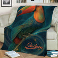 Detailed toucan blanket draped over a sofa, featuring vibrant feathers and tropical-inspired artwork