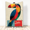 Colorful geometric toucan blanket displayed vertically with vibrant tropical bird artwork