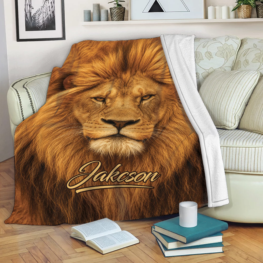 Lion throw blanket draped across a sofa, creating a bold wildlife-inspired lounging space